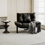 Fauteuil d'appoint contemporain en chenille noire capitonnée sans accoudoirs