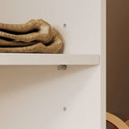 Armoire d'angle avec 2 tringles, un porte-pantalons et un rangement à chaussures