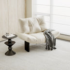 Fauteuil d'appoint contemporain en chenille noire capitonnée sans accoudoirs