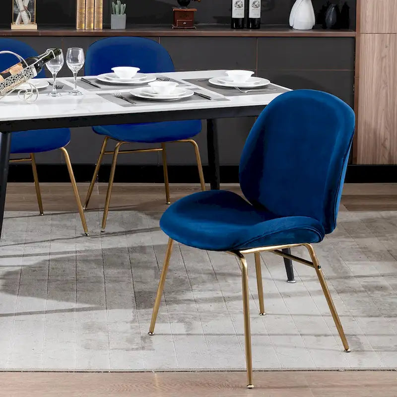 Chaise de salle à manger en velours et pieds dorés